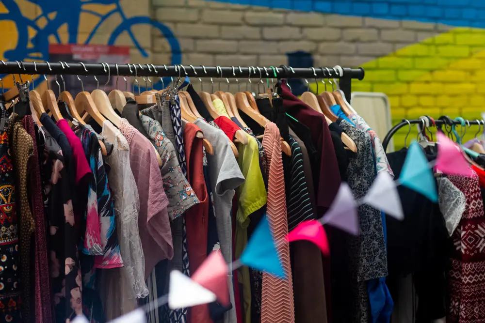 Clothes hanging on a clothes rail.