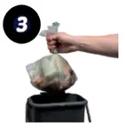 Hand putting food waste liner full of food into caddy with number 3 in corner.