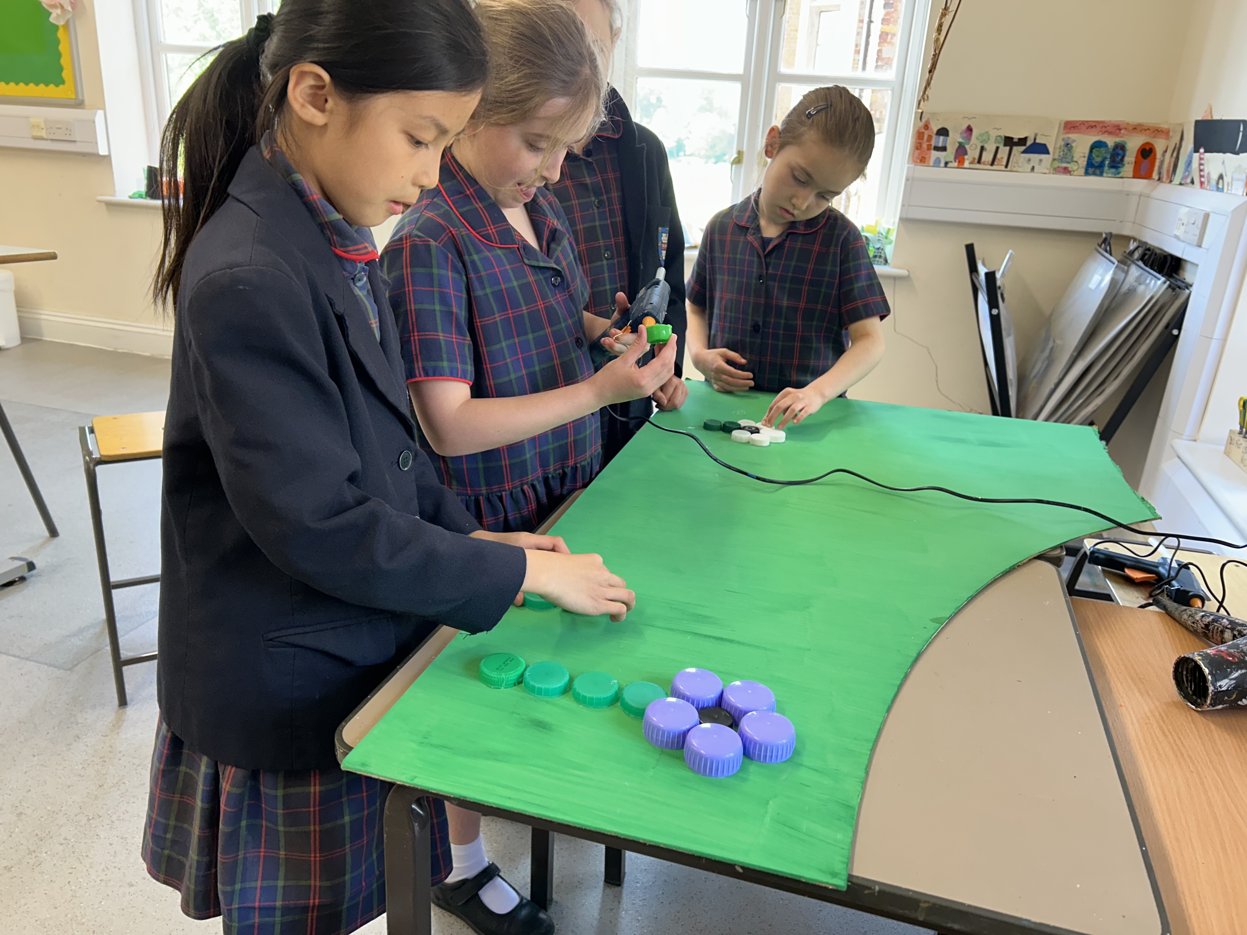 Pupils working on artwork 