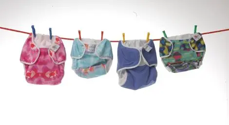 Cloth nappies hanging on a line.