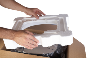 Person holding piece of polystyrene 