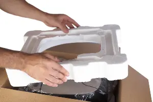 Person holding piece of polystyrene