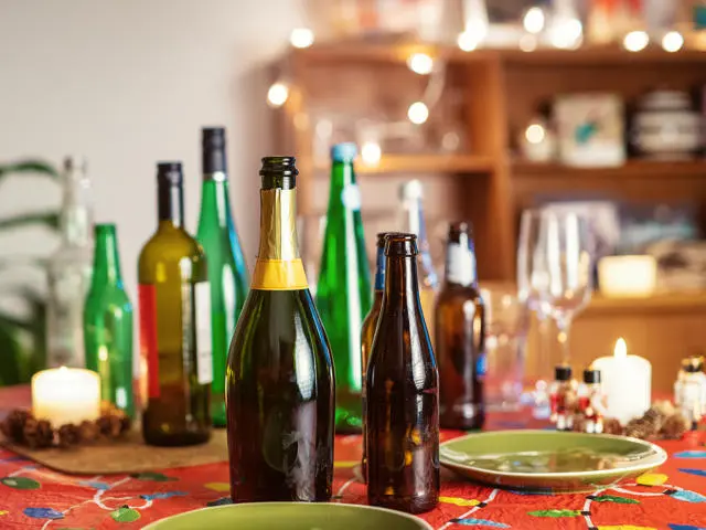 Empty glass bottles on a table.